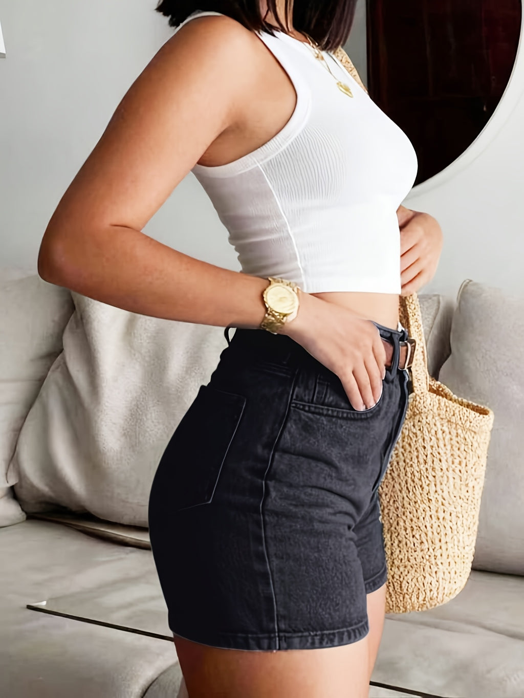 Women’s high-waist denim shorts with elastic waistband and multiple pockets.