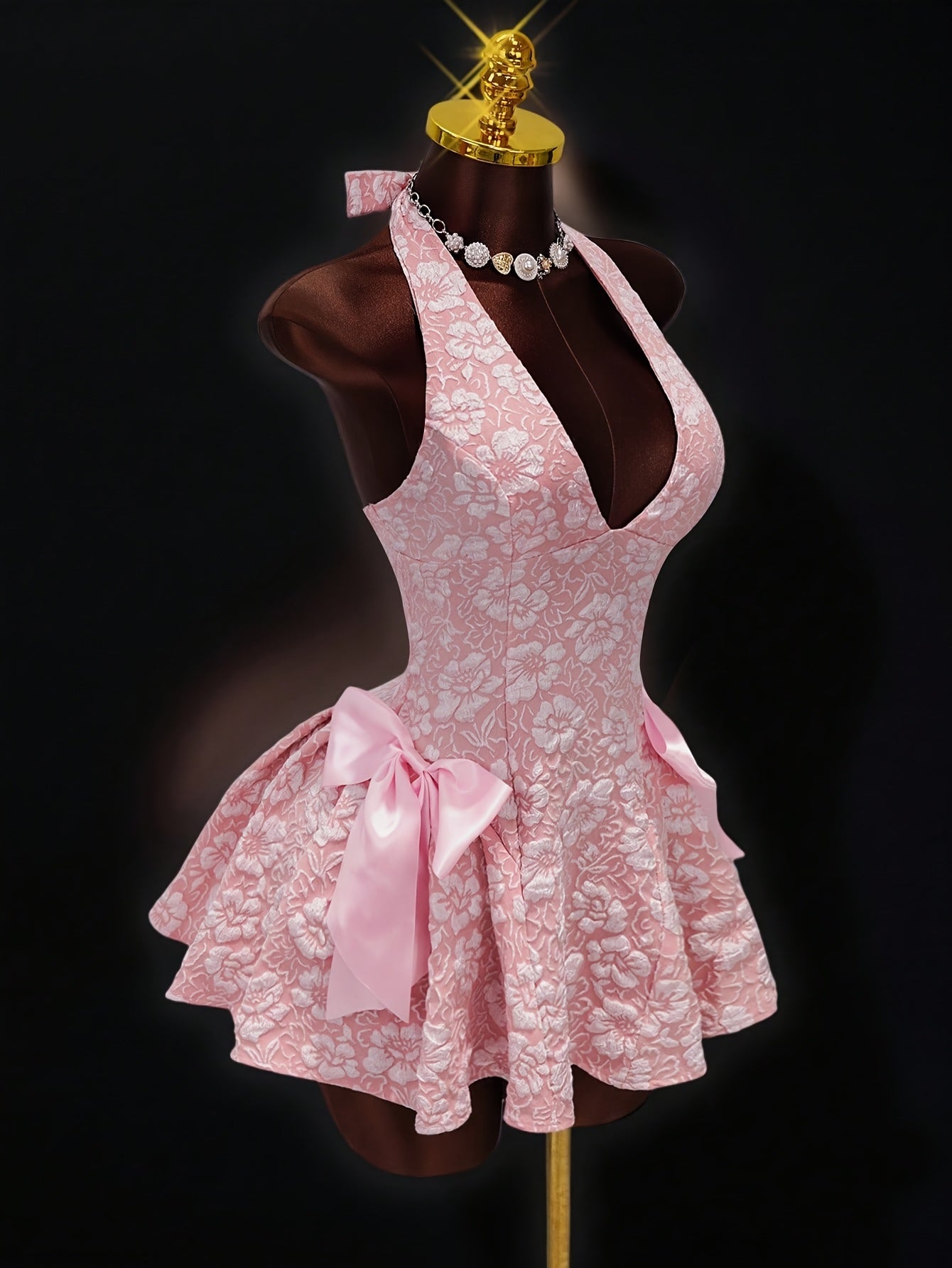 Pink halter dress with tulle skirt for summer outings.