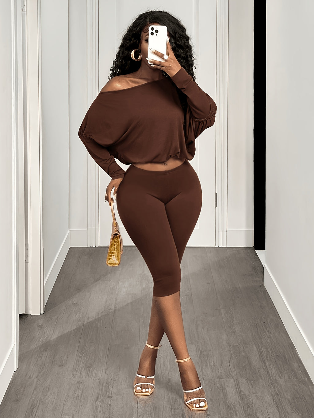 Women’s casual 2-piece set: off-shoulder top and 3/4 length pants.