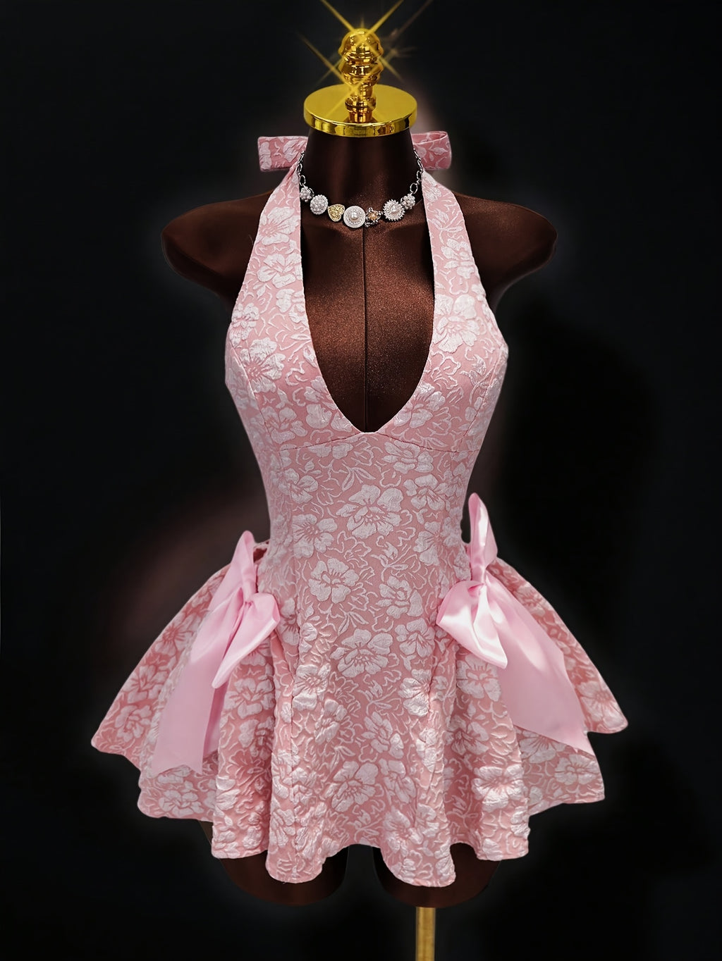 Pink halter dress with tulle skirt for summer outings.