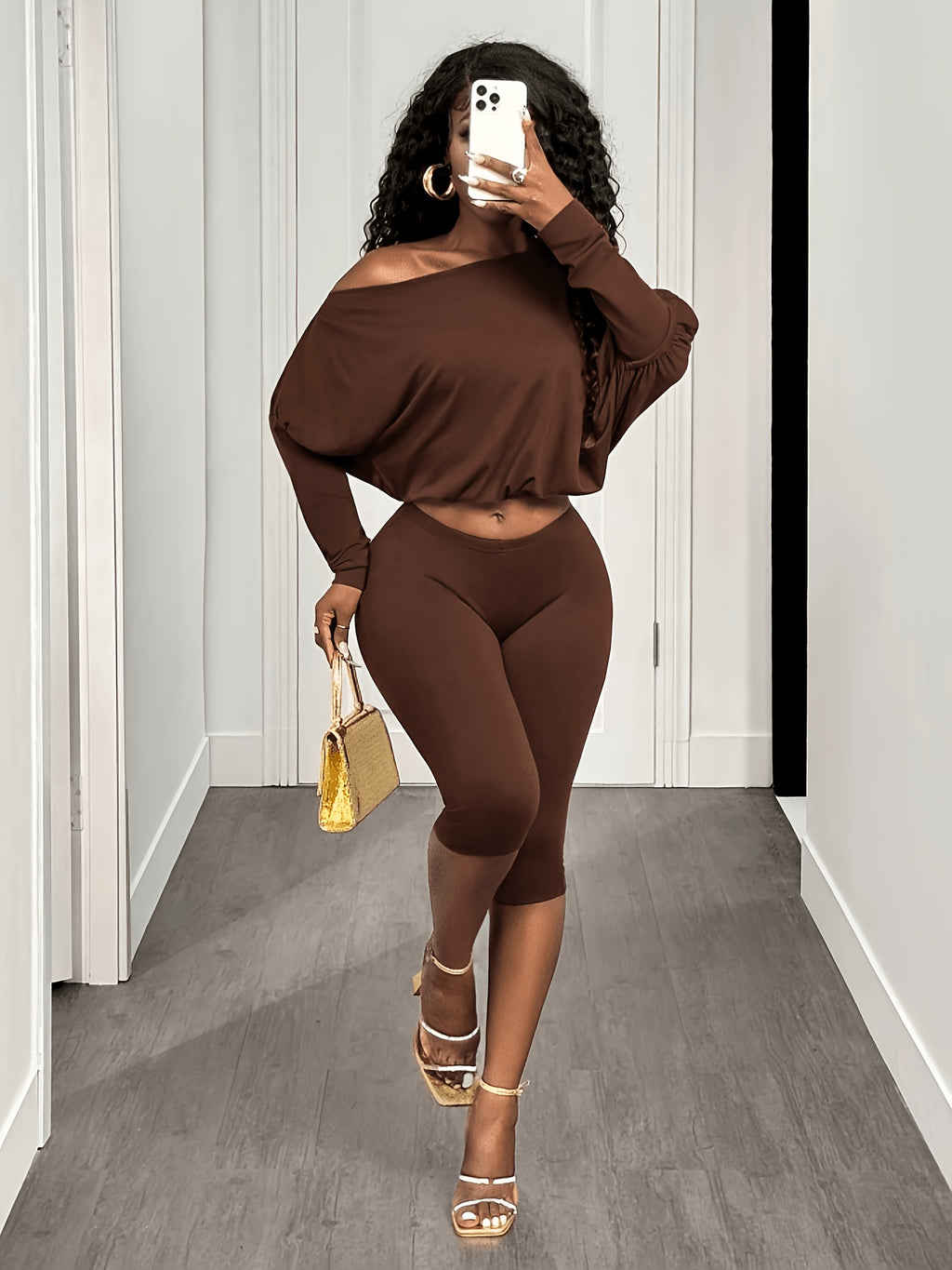 Women’s casual 2-piece set: off-shoulder top and 3/4 length pants.