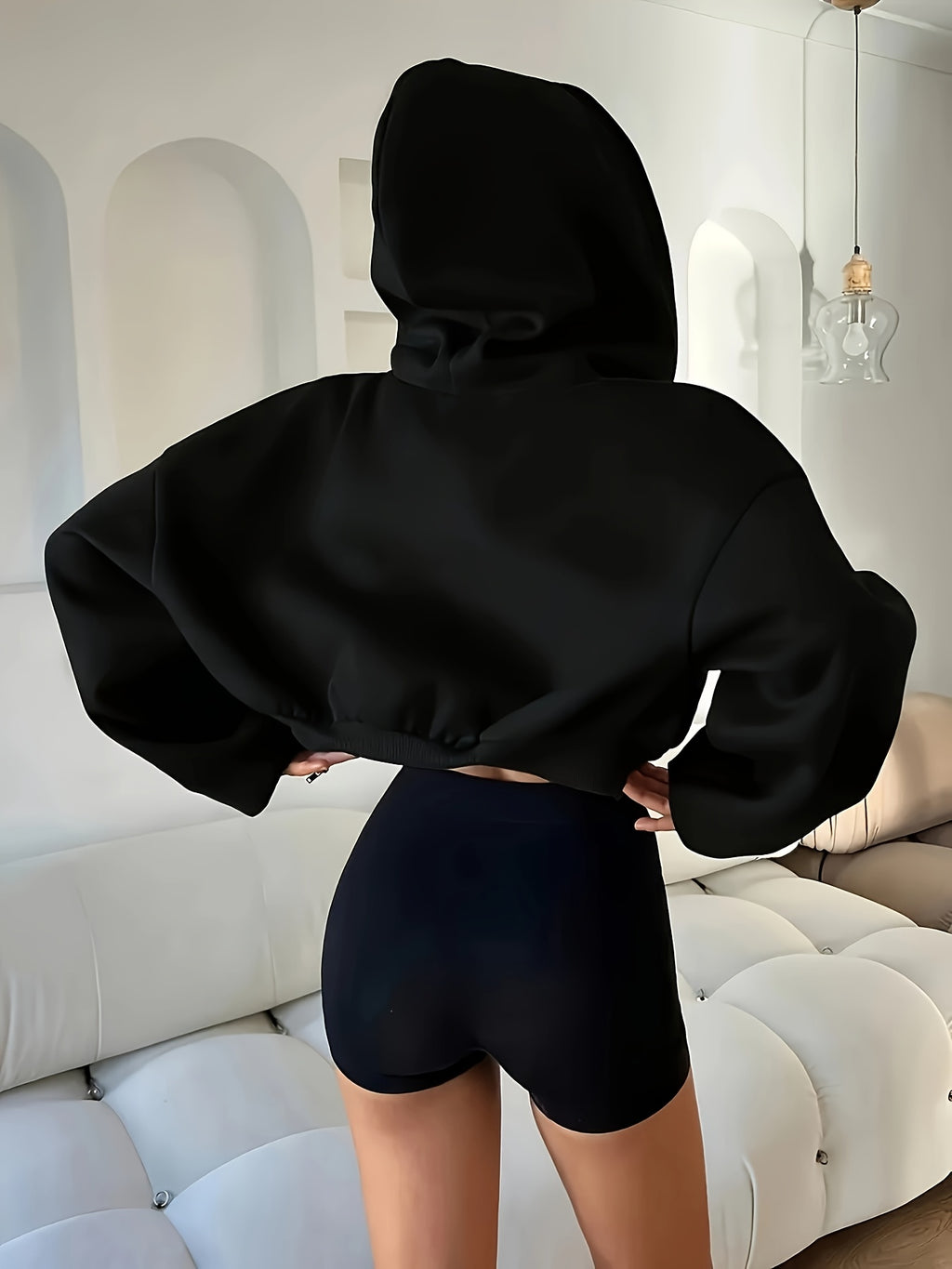 Women’s cropped zip-front hoodie jacket for autumn and winter.