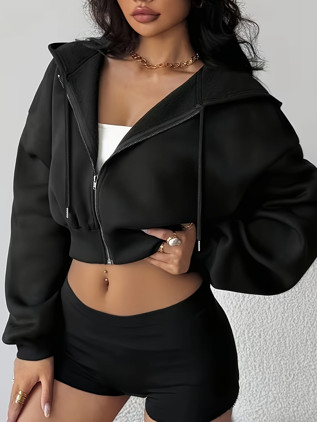 Women’s cropped zip-front hoodie jacket for autumn and winter.