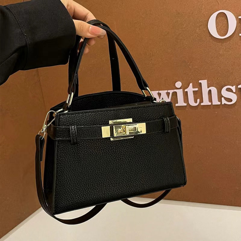 This High-End And Elegant Women'S Handbag Features Decorative Straps, Stylish And Elegant Hardware Embellishments, an Adjustable Shoulder Strap, And a Easy, Multi-Functional Solid-Color Shoulder Bag
