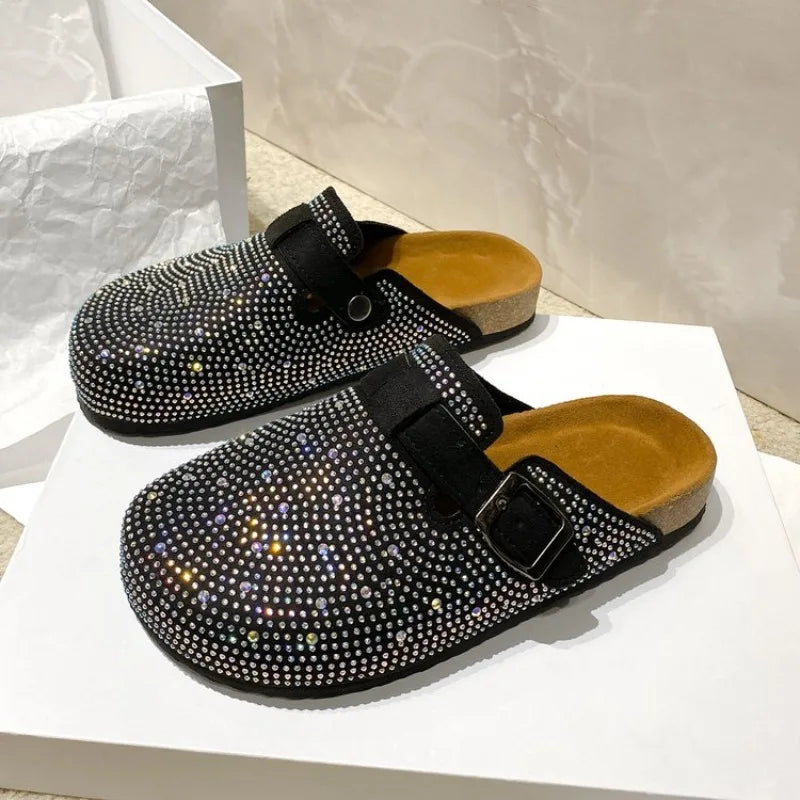 Women’s shoes: shiny rhinestone slippers, platform sandals, and cork clogs.