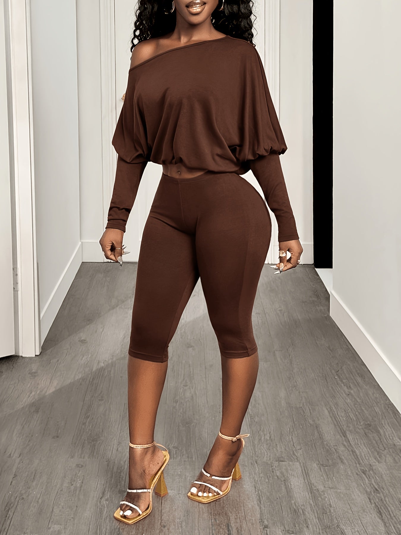Women’s casual 2-piece set: off-shoulder top and 3/4 length pants.