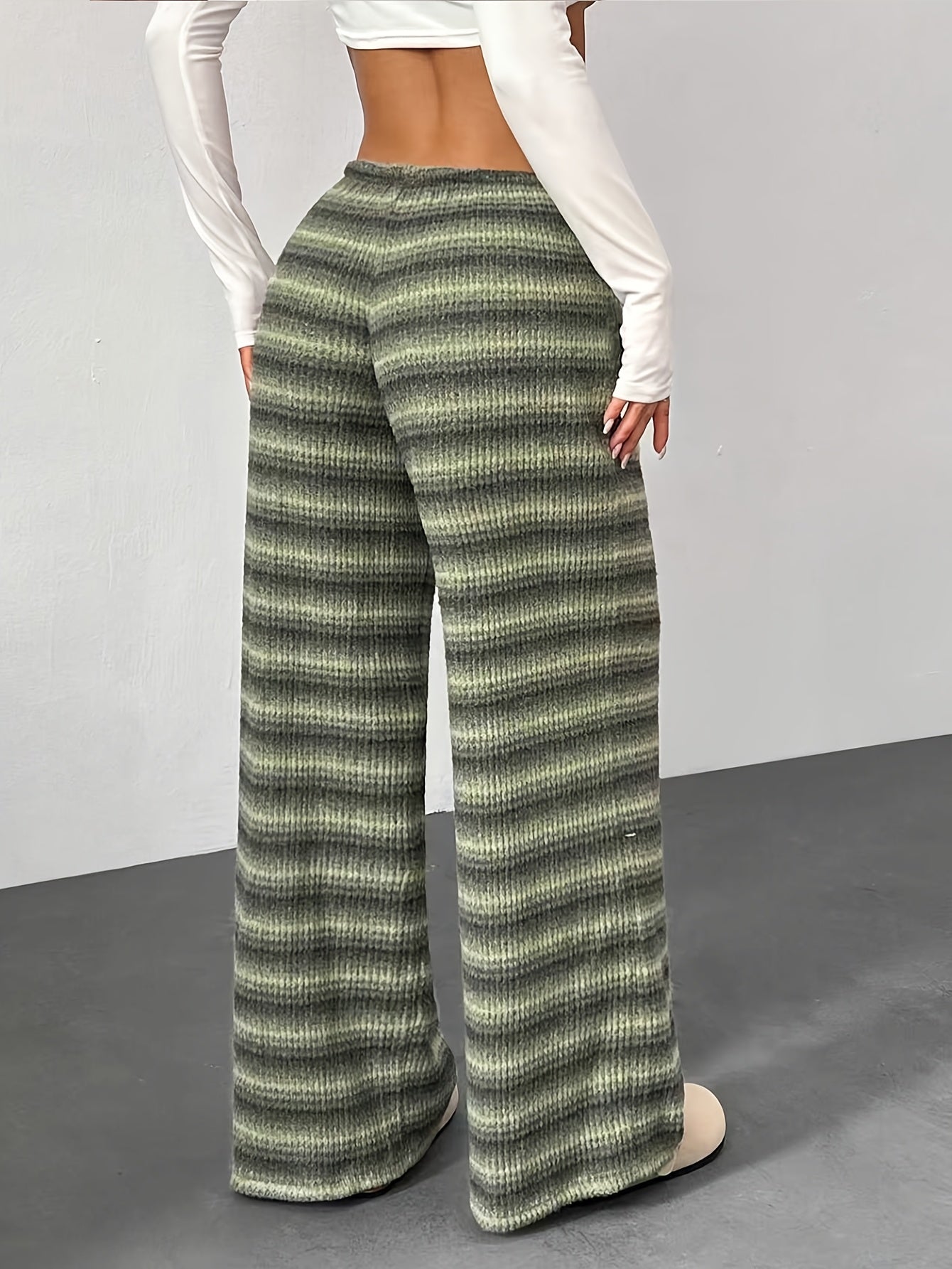 Women’s athletic wide-leg pants, drawstring, high-waist, drapey elastic fabric, lightweight.